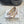 Hangisi 70 Rose Gold Metallic Leather Jewel Buckle Pumps 912618