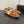 ALAIA BALLET FLATS IN COPPER BROWN MESH FISHNET WITH GOLD HARDWARE