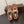 ALAIA BALLET FLATS IN COPPER BROWN MESH FISHNET WITH GOLD HARDWARE