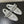 ALAIA SPHERE BALLET FLATS IN SILVER LAMBSKIN