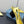 CUT-OUT PUMPS WITH BEAD BUCKLE IN LIGHT YELLOW SATIN