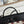 HERBAG ZIP 31 LAQUERED BAG IN BROWN MIX YELLOW H PLUME CANVAS
