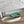 MINI NEO 17 EVELYNE BAG IN EMERALD GREEN CANVAS AND WHITE CALFSKIN