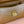 CHAIN SHOULDER BAG 24 IN PEANUT BROWN PATENT SMOOTH CALFSKIN
