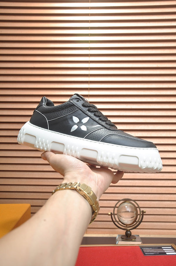 LV TRAINER BLACK MONOGRAM CALFSKIN