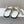 PETAL BELT FLAT SANDAL IN WHITE CALFSKIN
