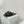 ALAIA VIENNE FLAT MULES IN BLACK LAMBSKIN