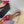 ALAIA LE COEUR FLAT SLINGBACKS IN CHERRY RED PATENT LAMBSKIN