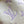 NANO NOÉ 16 IN WHITE PURPLE MONOGRAM EMBOSSED CALFSKIN