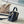 CAPUCINES EAST-WEST MINI 22 IN BLACK CALFSKIN GOLD HARDWARE