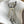 CAPUCINES EAST-WEST 33 IN WHITE CALFSKIN SILVER HARDWARE