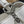 CAPUCINES EAST-WEST MINI 22 IN WHITE CALFSKIN SILVER HARDWARE