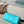 KEEPALL BANDOULIÈRE 25 IN TURQUOISE BLUE MONOGRAM EMBOSSED CALFSKIN