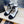 CC COMBAT BOOTS IN WHITE WRINKLED CALFSKIN AND BLACK GROSGRAIN WITH FAUX PEARL