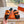 CHYPRE SANDAL IN VIVID ORANGE MIX BLACK CALFSKIN