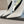 ZIPPER POINTED-TOE HIGH PUMPS IN WHITE WAX-OIL SHEEPSKIN