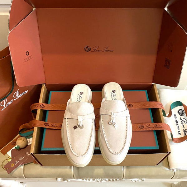 LP 26s Lock Charm Mules In Cream White Suede