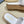 PRA WEDGE FLATFORM SLIDES WHITE RAFFIA