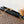 WALLET ON CHAIN CAPUCINES 23 IN BLACK SMOOTH CALFSKIN GOLD HARDWARE