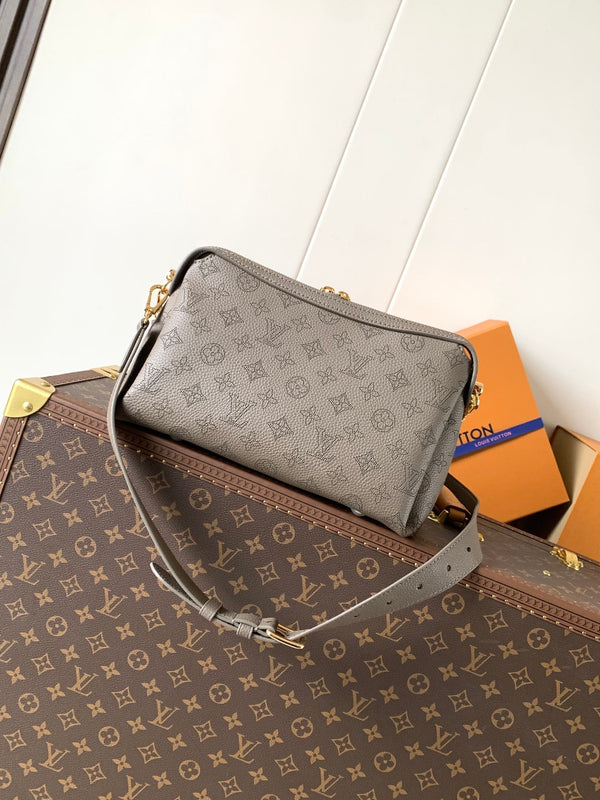 LV M25904 Hand It All PM Taupe Perforated Mahina Calfskin