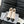 CC SHORT BOOTS 65 MM IN WHITE MIX BLACK QUILTED PATTERN LAMBSKIN