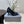 CURVED HEEL SHALLOW MOUTH PUMPS IN BLACK CALFSKIN