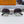 SIGNATURE ROUND SUNGLASS 581381 IN GOLD METAL GREY SMOKE LENSES
