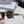 TRIOMPHE SUNGLASS 513000 IN GOLD METAL BLACK LENSES