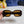 TRIOMPHE SQUARE SUNGLASS 566742 IN CAMEL ACETATE