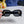 TRIOMPHE SQUARE SUNGLASS 566744 IN BLACK ACETATE