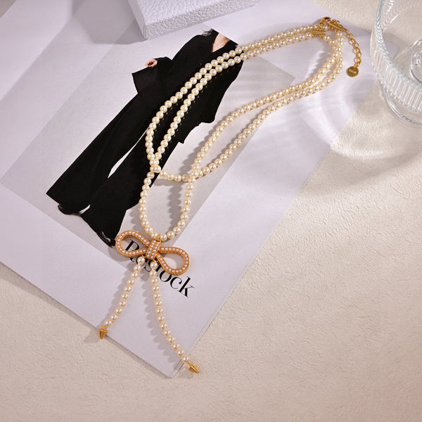 CD 26S Pearl Bow Drop Statement Necklace In Gold Tone Metal 629848