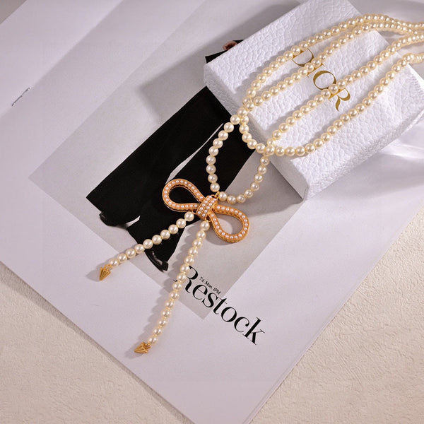 CD 26S Pearl Bow Drop Statement Necklace In Gold Tone Metal 629848