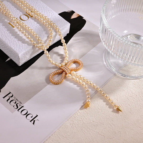 CD 26S Pearl Bow Drop Statement Necklace In Gold Tone Metal 629848