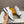 LV TRAINER SNEAKER WHITE EMBOSSED CALFSKIN AND GREY SUEDE