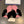 GLOVES IN FLAMINGO PINK WOOL WITH LARGE BLACK BOW 464995