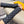FINGERLESS LONG GLOVES IN BLACK MONOGRAM DENIM AND LAMBSKIN