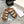 TIPPI SLIDE IN WHITE SHEARLING AND BROWN CALFSKIN
