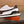 LV SNEAKERS IN GREY MIX BROWN CALFSKIN AND BRANDED PRINTED FABRIC