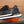 LV SNEAKERS IN BLACK CALFSKIN AND BRANDED PRINTED FABRIC