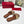 Vlogo embellished leather-trimmed raffia slides tan