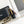 CC MINI 13 CLUTCH WITH STRAP IN BLACK LAMBSKIN AND PINK BOW