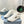 PRA DOWNTOWN PERFORATED SNEAKERS WHITE AND BLACK LOGO CALFSKIN