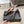 ALAIA SPIKE JEWEL MULES IN BLACK CALFSKIN
