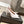 ALAIA SPIKE JEWEL MULES IN WHITE CALFSKIN