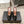 ALAIA SPIKE JEWEL MULES IN BLACK GLOSSY CALFSKIN