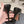 ALAIA SPIKE JEWEL MULES IN BLACK GLOSSY CALFSKIN WITH GOLD HARDWARE