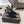 DUNE HIGH 10 CM SLINGBACK PUMPS IN BLACK PATENT LEATHER WITH GREEN CRYSTAL