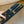 LV INITIALES STUDS 30 MM REVERSIBLE BELT IN BLACK CALFSKIN GOLD HARDWARE