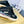 SNEAKER MULES IN BLACK CANVAS GRAFFITI LOGO