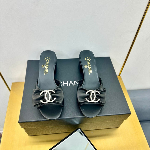 cc 25 bow mule sandal 50mm black sheepskin 238478